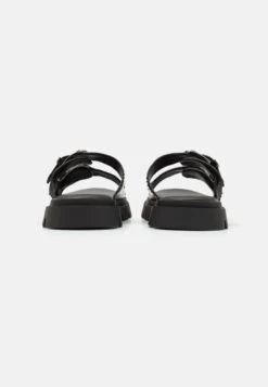YOURTURN UNISEX - Mules - Black 10 YOURTURN UNISEX - Mules - Black -Yourturn Shop b2f94a92334248fc837fdd8a95135192